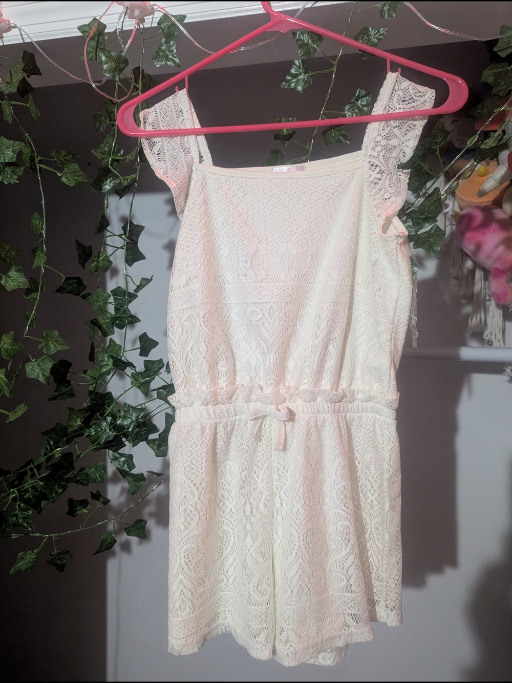 Lace Sleeveless Romper In Off White